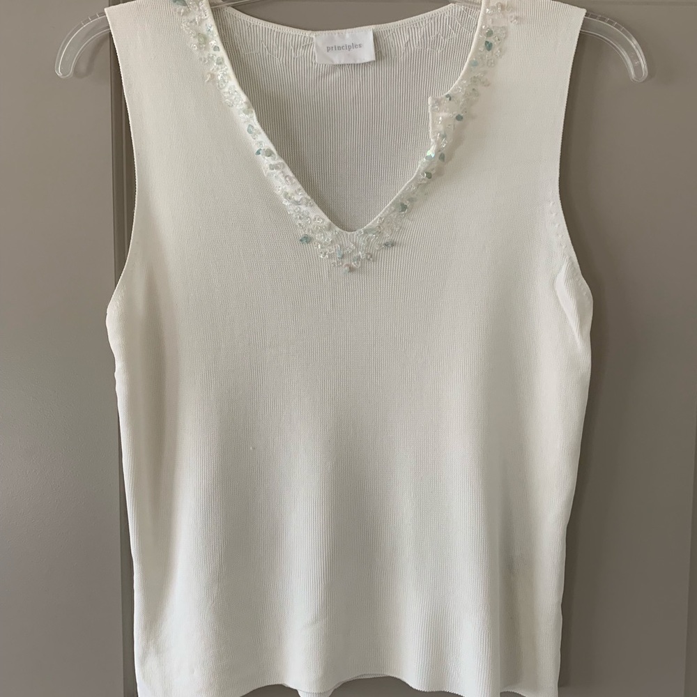 Gorgeous knit sleeveless sweater with bead detail